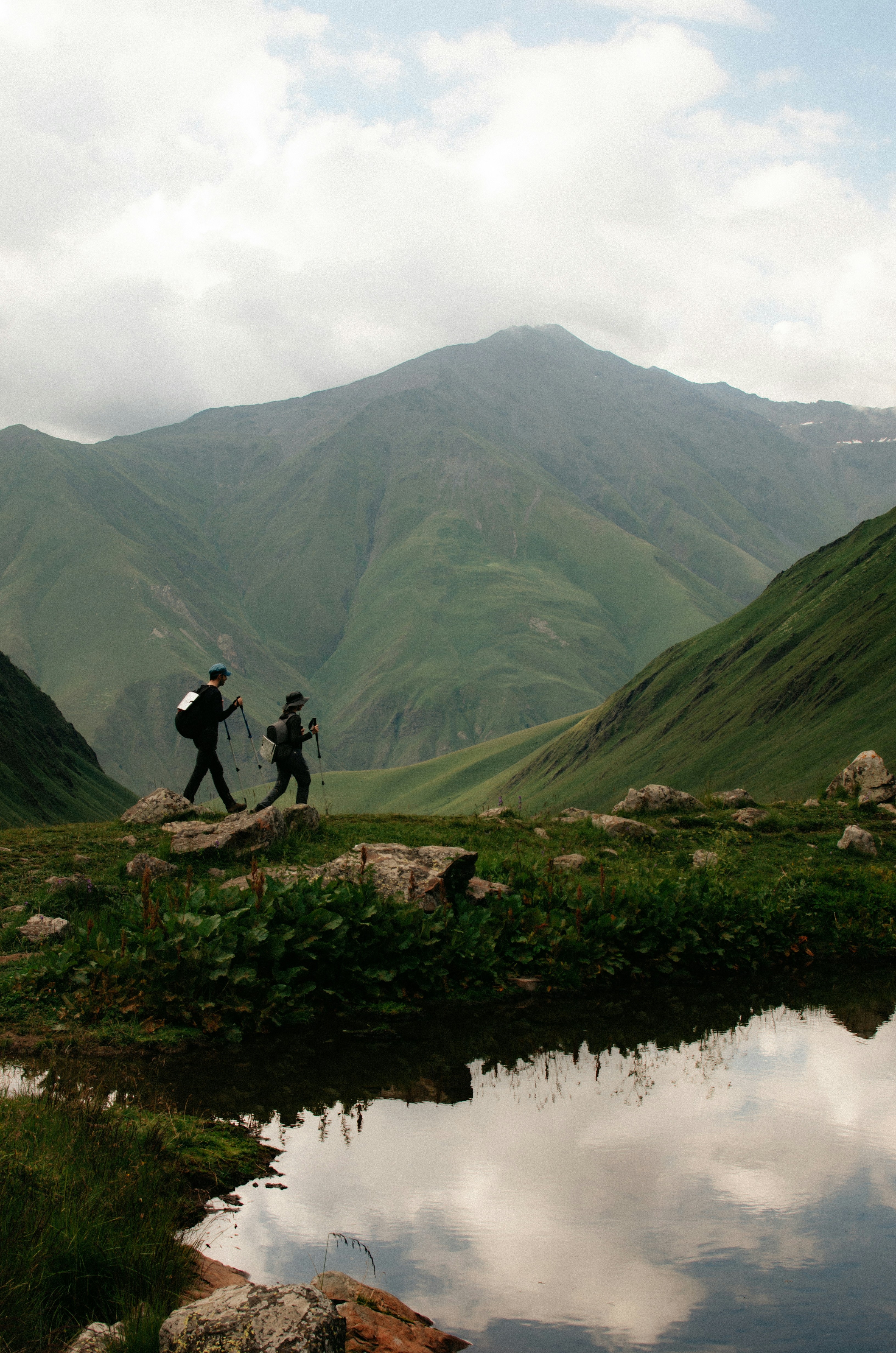 Watch and backpack representing rucking pace tracking